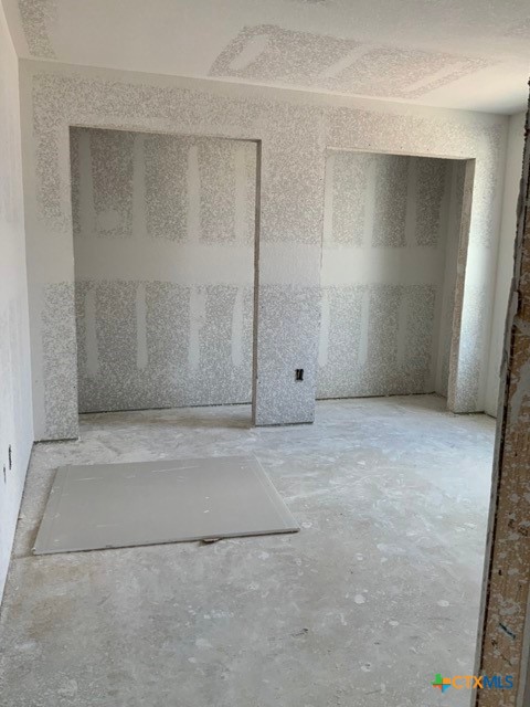 1424 Four Sixes Ranch Road Salado, TX 76571 - Photo 12 of 14 an empty room with a bench