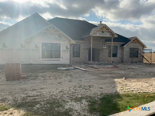 1424 Four Sixes Ranch Road Salado, TX 76571 - Photo 2 of 14 a front view of a house with garden