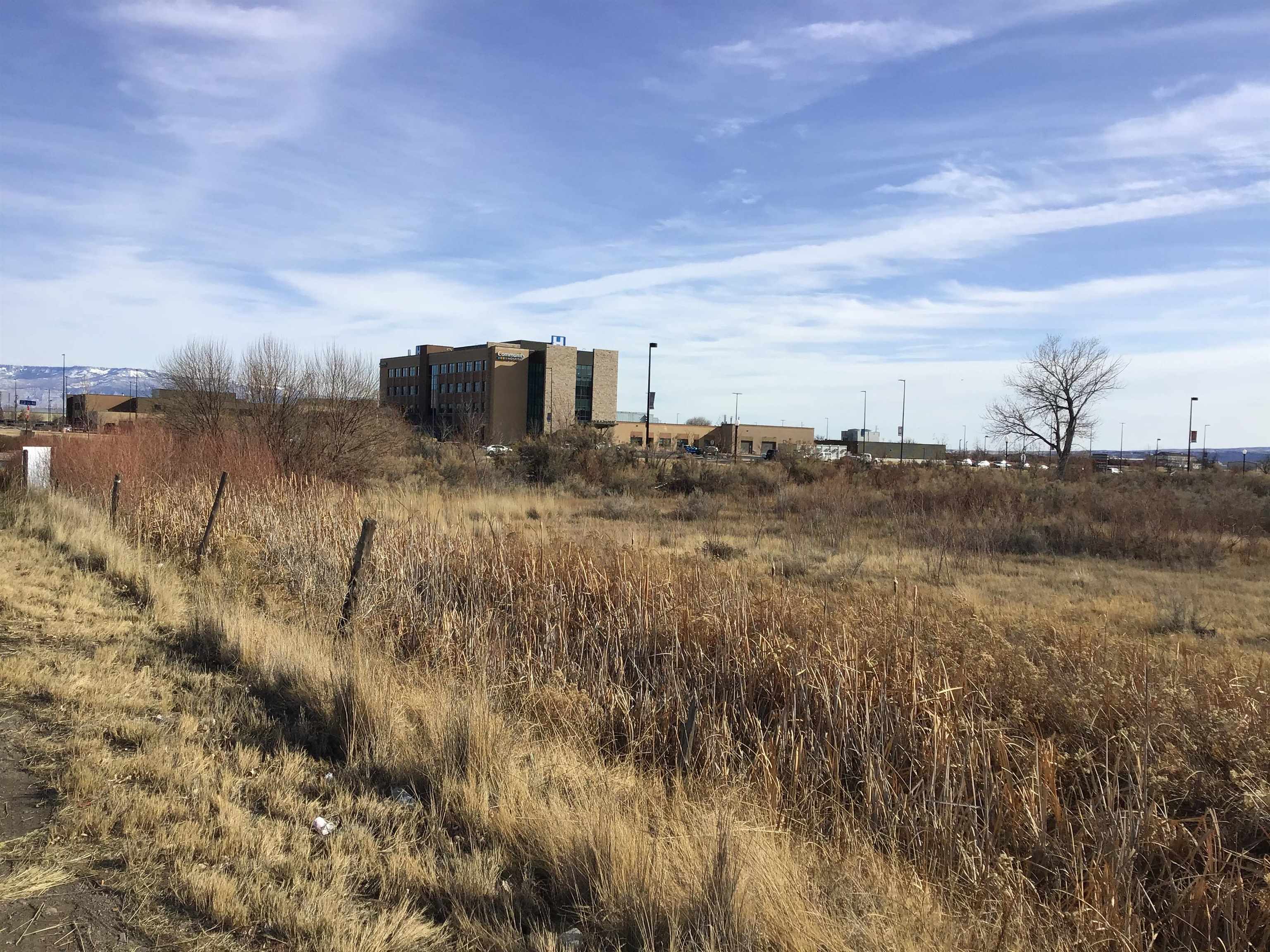 2352 G Road, Unit LOT 1 Grand Junction, CO 81505 - Photo 7 of 8 a view of a dry yard with wooden fence