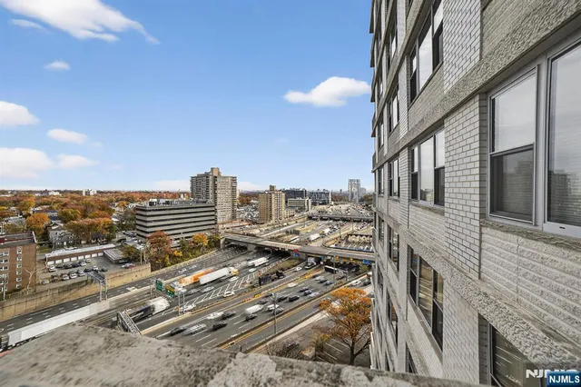 a view of a city with tall buildings