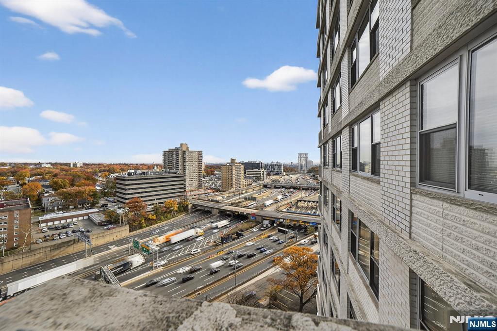2100 Linwood Avenue, Unit 17U Fort Lee, NJ 07024 - Photo 16 of 23 a view of a city with tall buildings