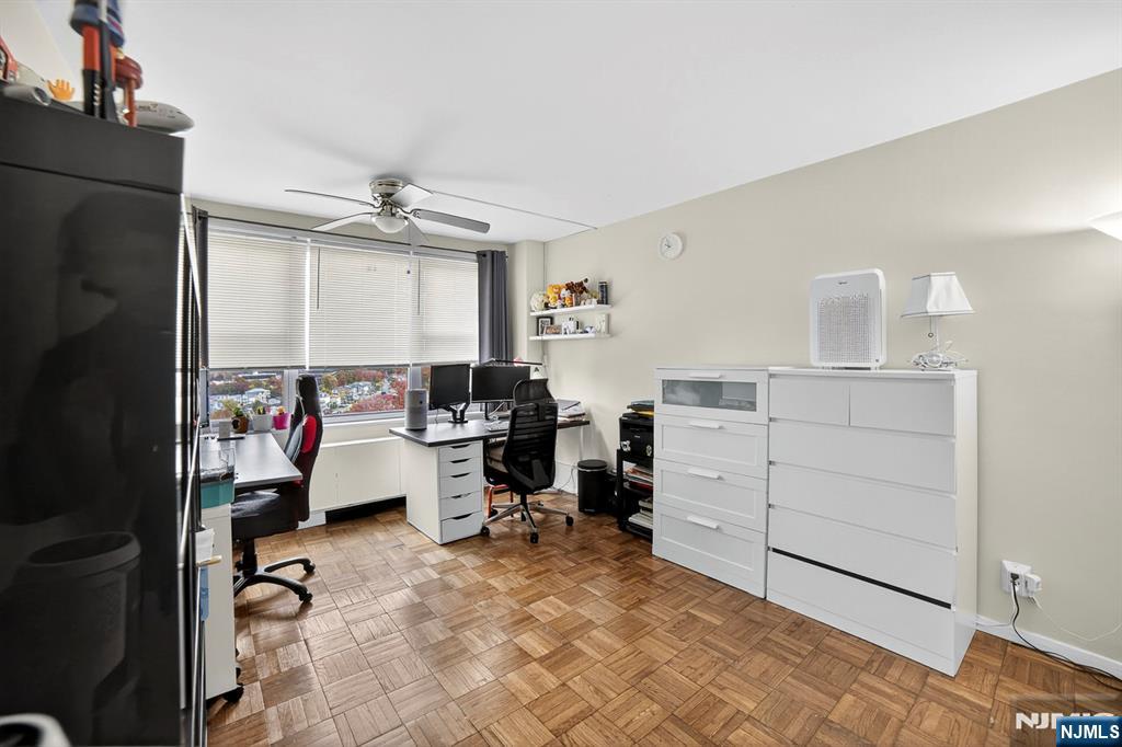2100 Linwood Avenue, Unit 17U Fort Lee, NJ 07024 - Photo 20 of 23 a view of a workspace with furniture and a window