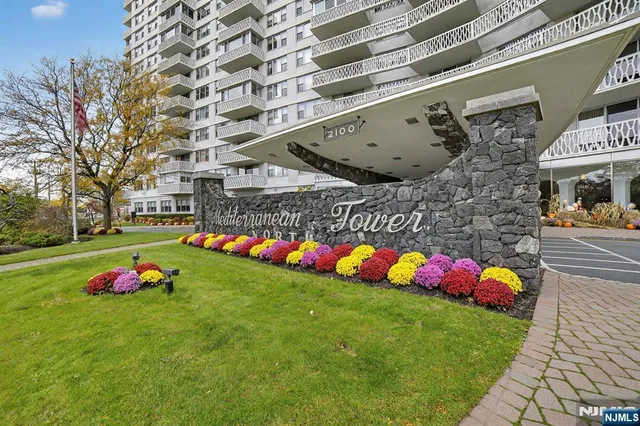 a front view of building with an outdoor space