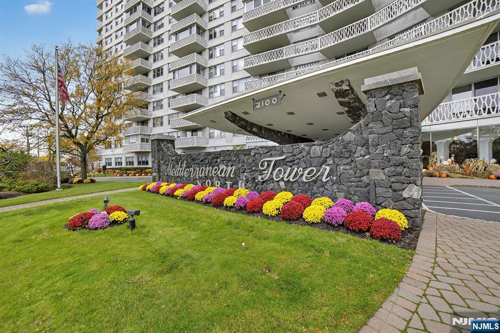 2100 Linwood Avenue, Unit 17U Fort Lee, NJ 07024 - Photo 2 of 23 a front view of building with an outdoor space