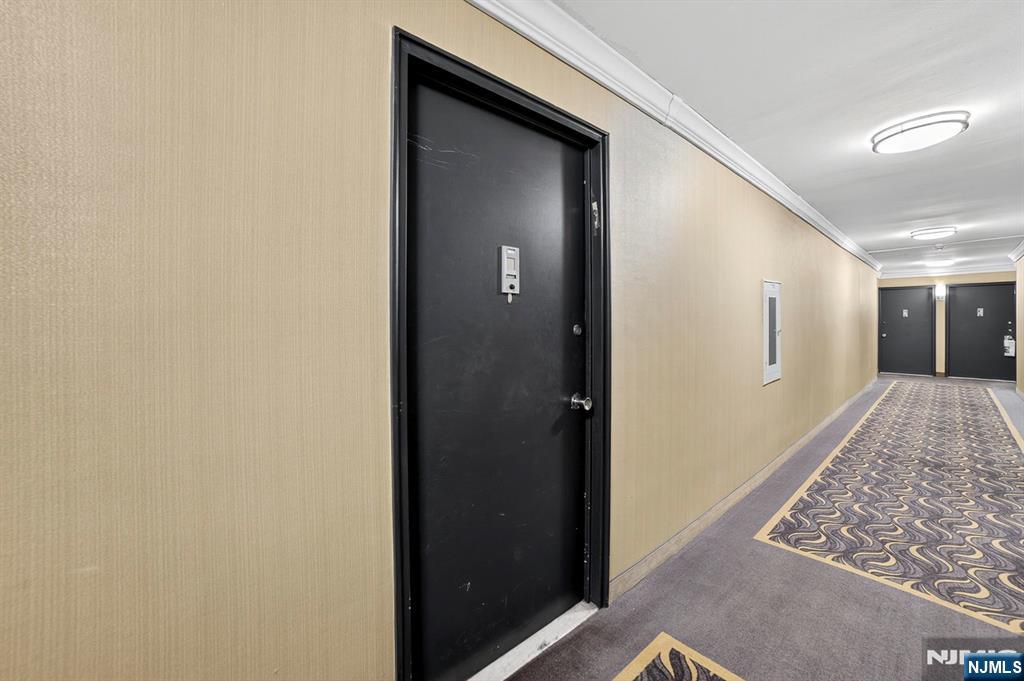 2100 Linwood Avenue, Unit 17U Fort Lee, NJ 07024 - Photo 6 of 23 a view of hallway
