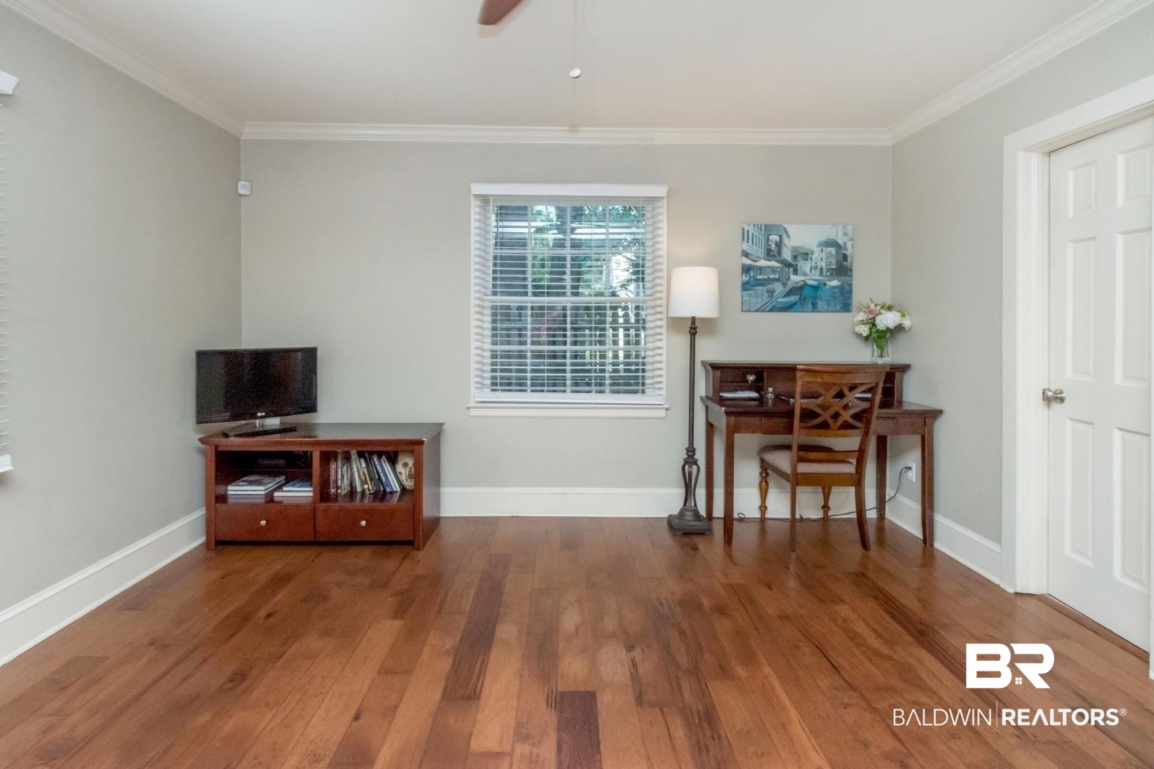 116 Florence Place Mobile, AL 36607 - Photo 15 of 41 Misc room with ceiling fan, hardwood / wood-style flooring, and ornamental molding