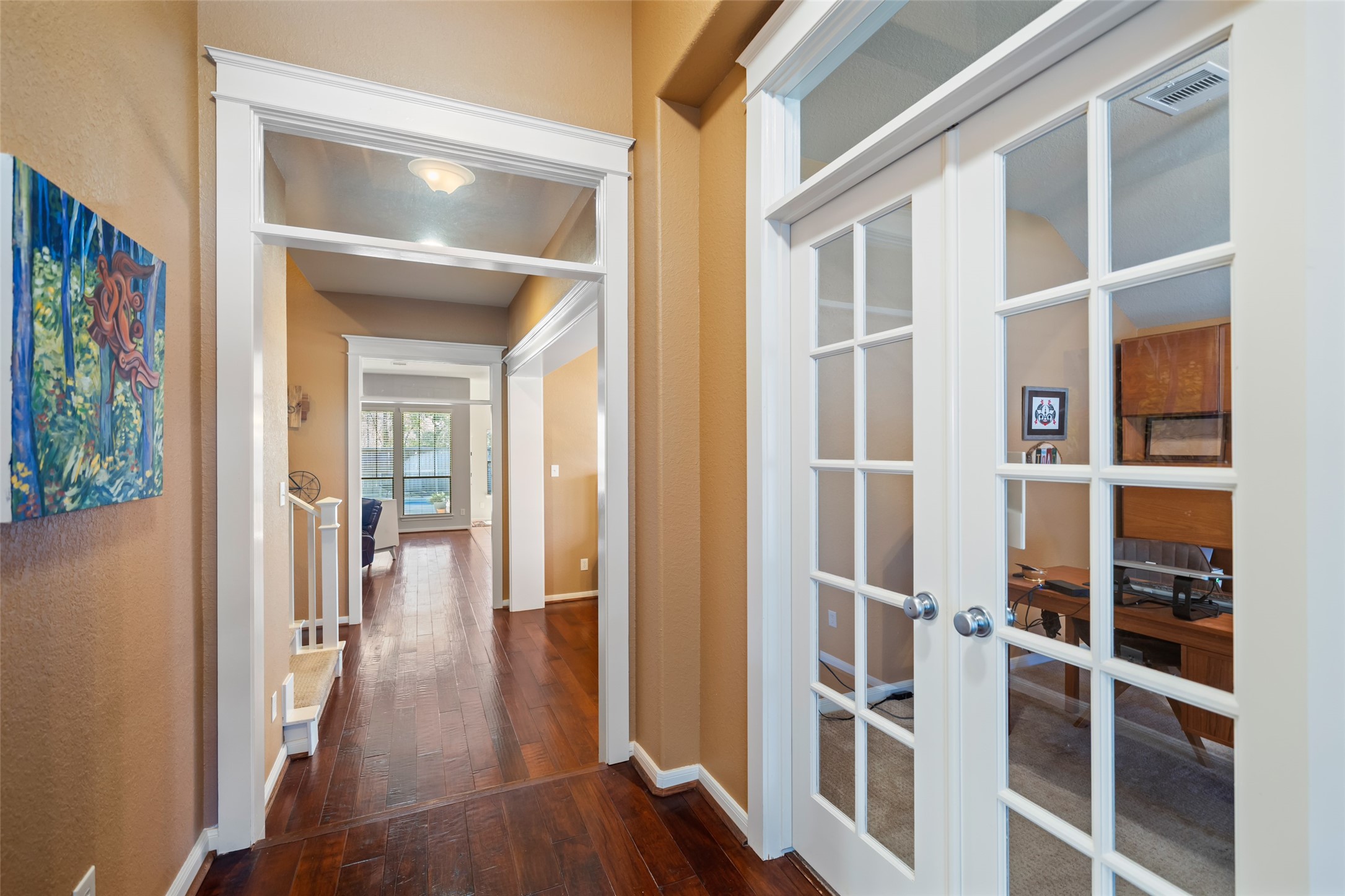 28318 Ryans Ridge Lane Spring, TX 77386 - Photo 9 of 48 a view of a hallway with wooden floor and windows
