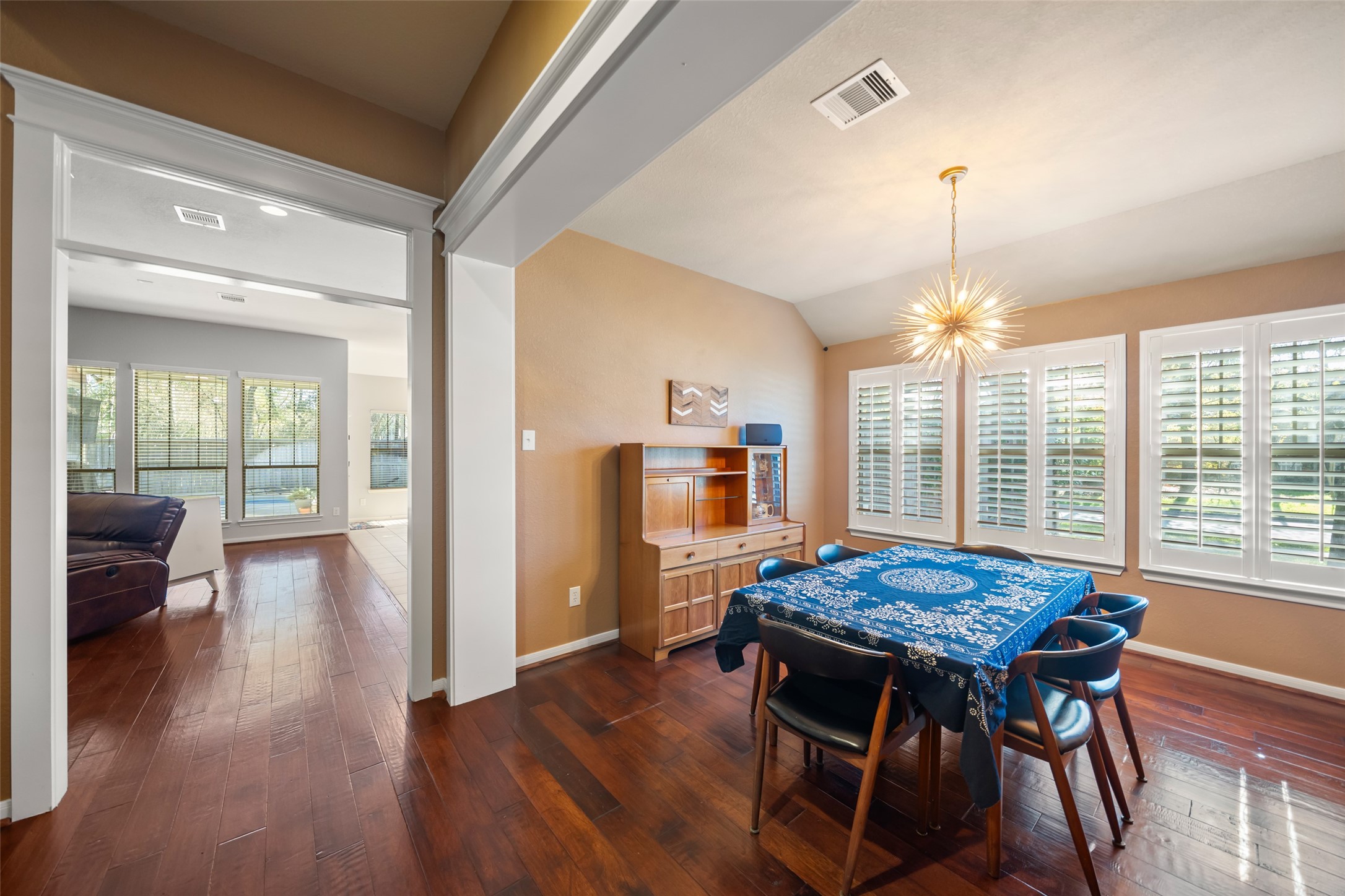 28318 Ryans Ridge Lane Spring, TX 77386 - Photo 15 of 48 a view of a dining room with furniture window and wooden floor