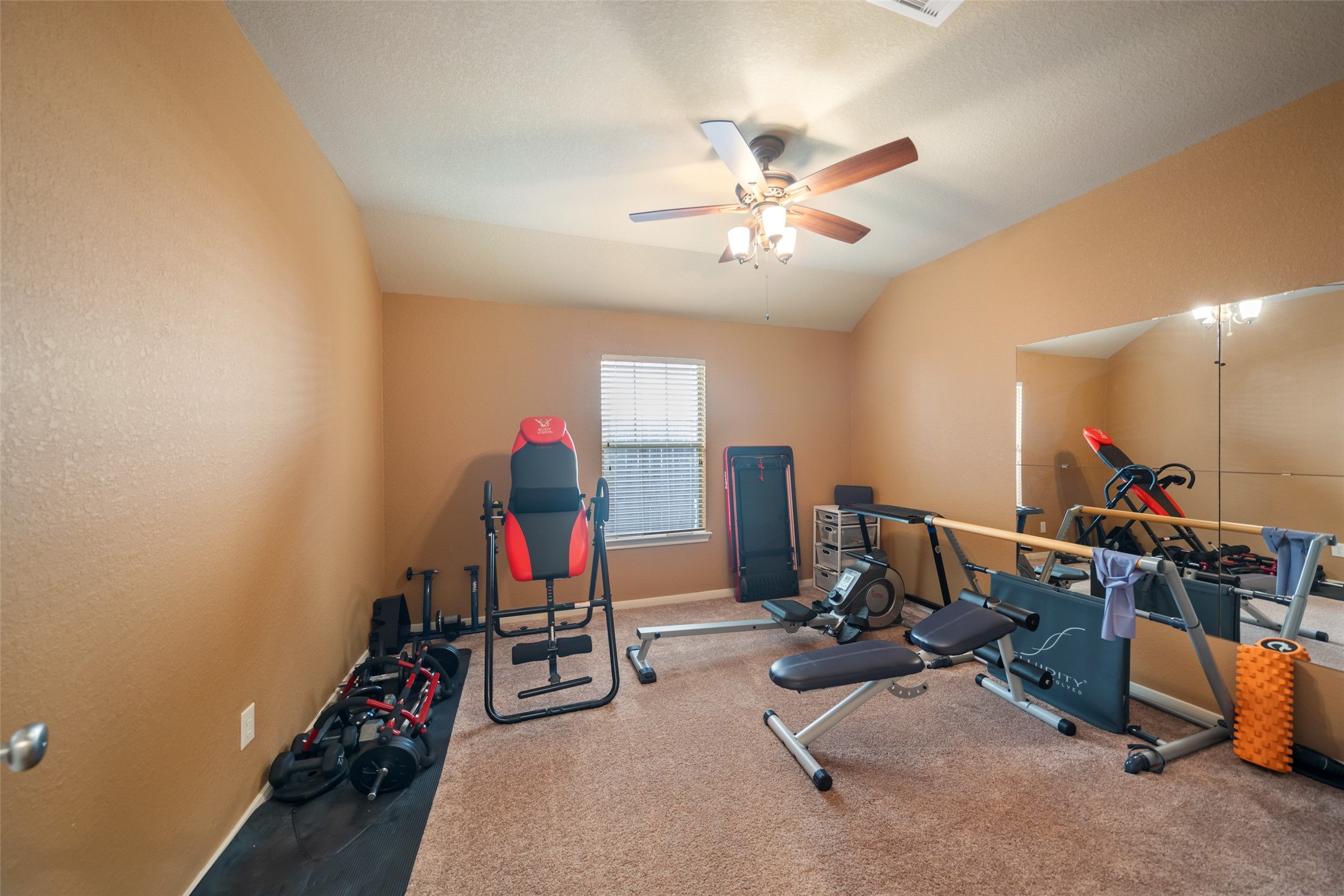 28318 Ryans Ridge Lane Spring, TX 77386 - Photo 26 of 48 a view of a room with gym equipment
