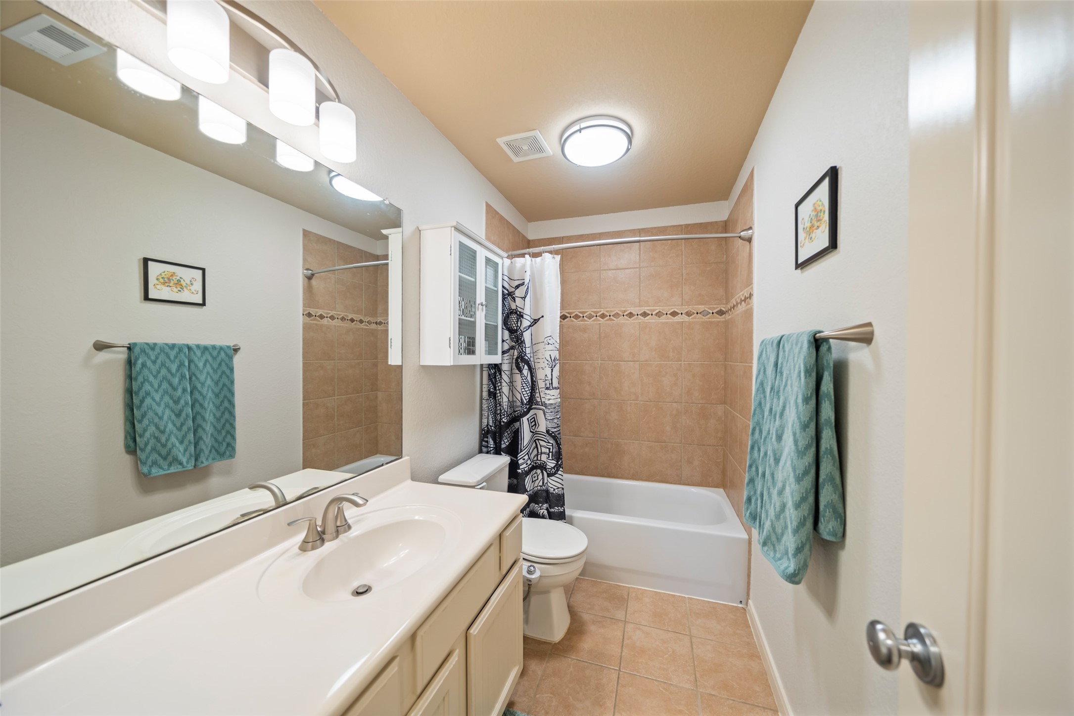 28318 Ryans Ridge Lane Spring, TX 77386 - Photo 27 of 48 a bathroom with a sink a toilet and shower