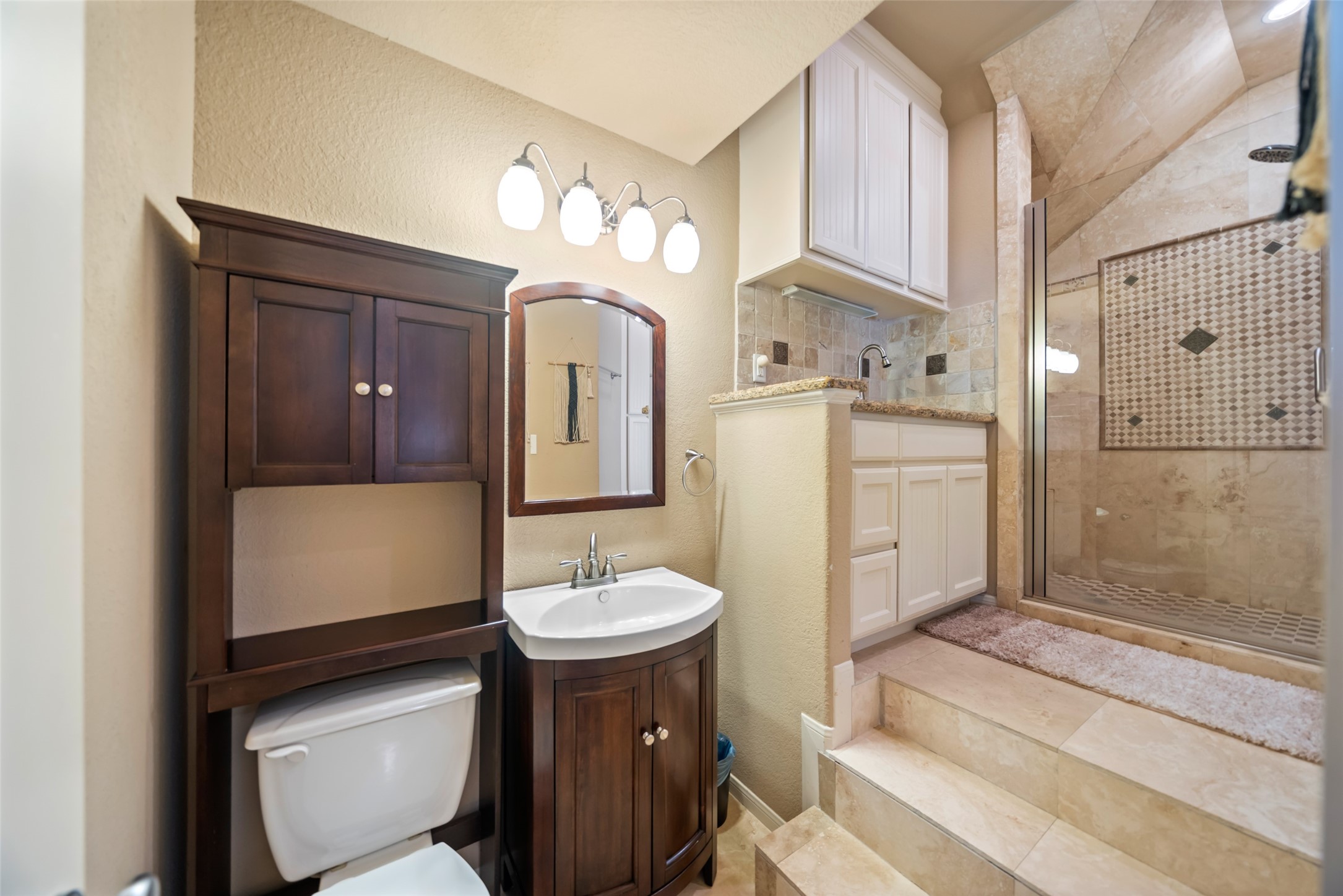 28318 Ryans Ridge Lane Spring, TX 77386 - Photo 30 of 48 a bathroom with a sink toilet and shower