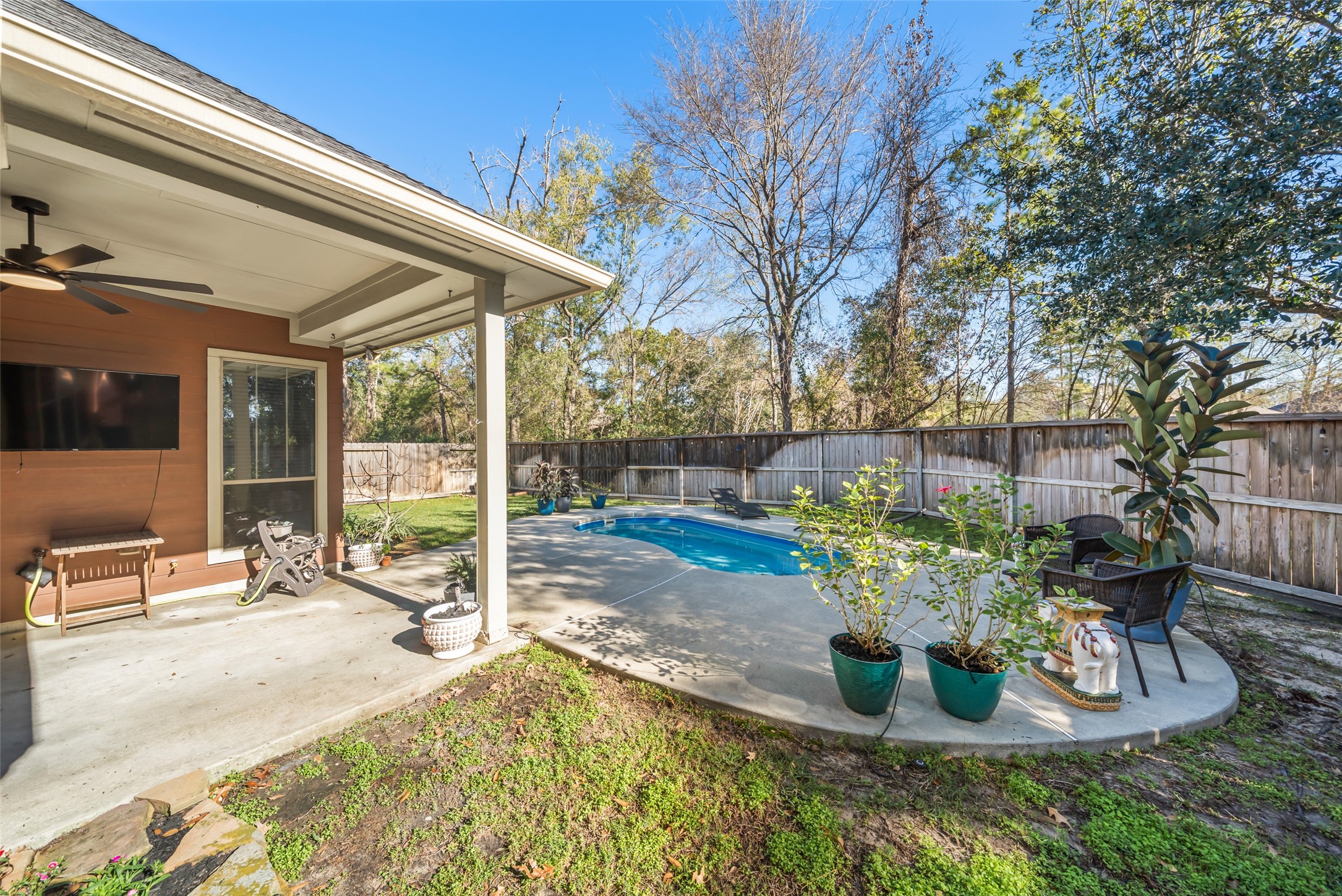 28318 Ryans Ridge Lane Spring, TX 77386 - Photo 31 of 48 a view of a porch with furniture and a backyard