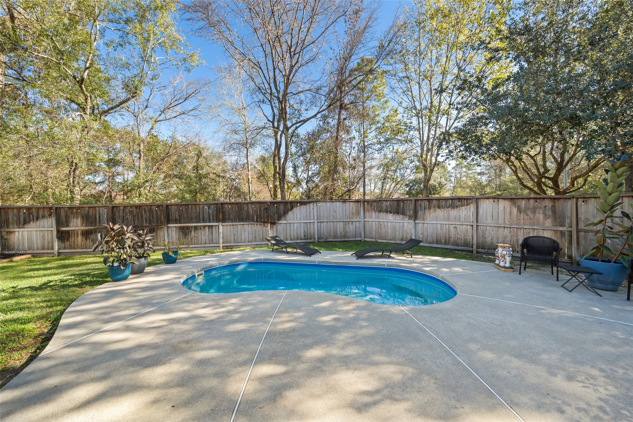 28318 Ryans Ridge Lane Spring, TX 77386 - Photo 32 of 48 a view of a backyard with swimming pool