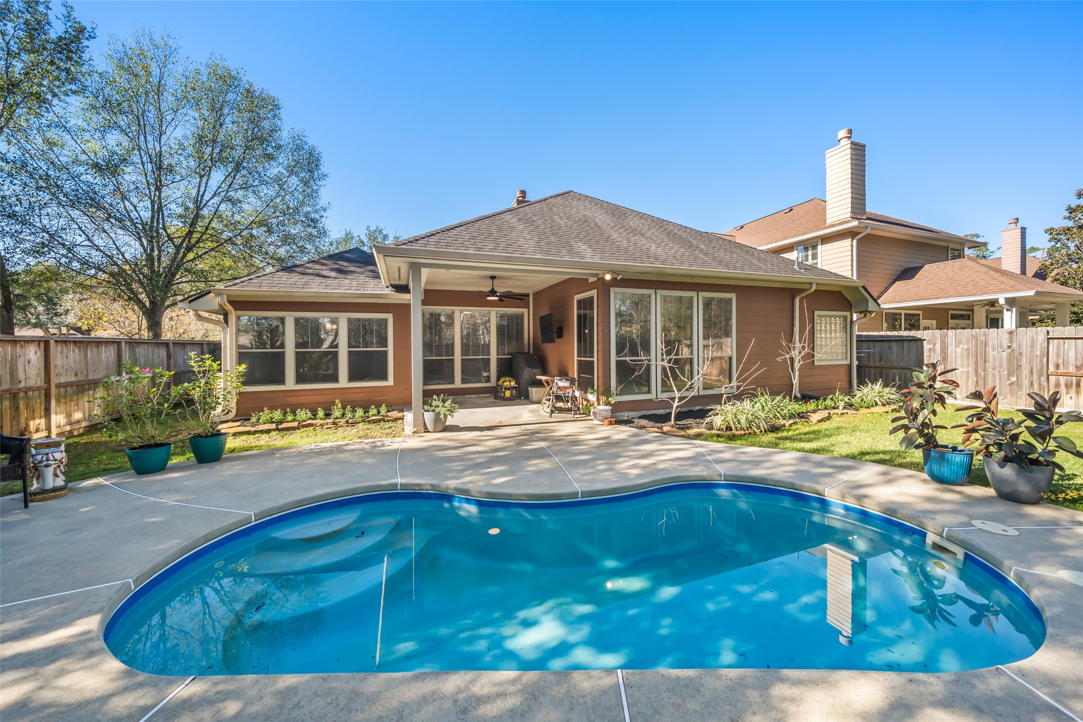 28318 Ryans Ridge Lane Spring, TX 77386 - Photo 44 of 48 a house view with swimming pool in front of it