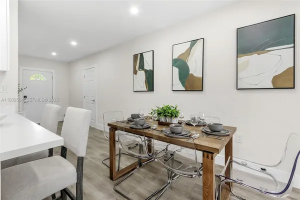 a view of a dining room with furniture