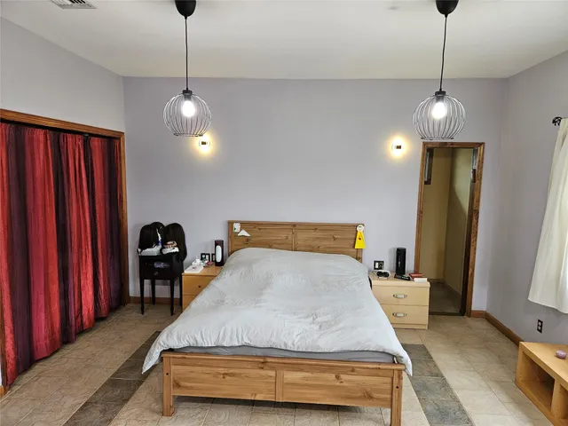 a bathroom with a sink a mirror and a shower