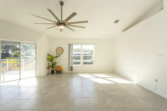 a view of a chair and table in a patio