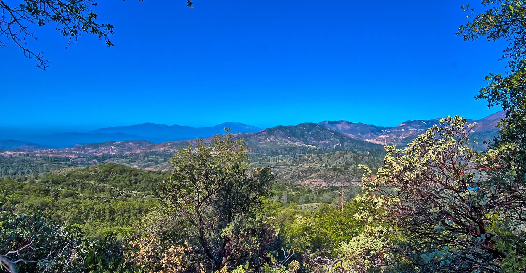 Walker Mine Road Redding, CA 96003 - Photo 22 of 38 a view of a city with a mountain in the background