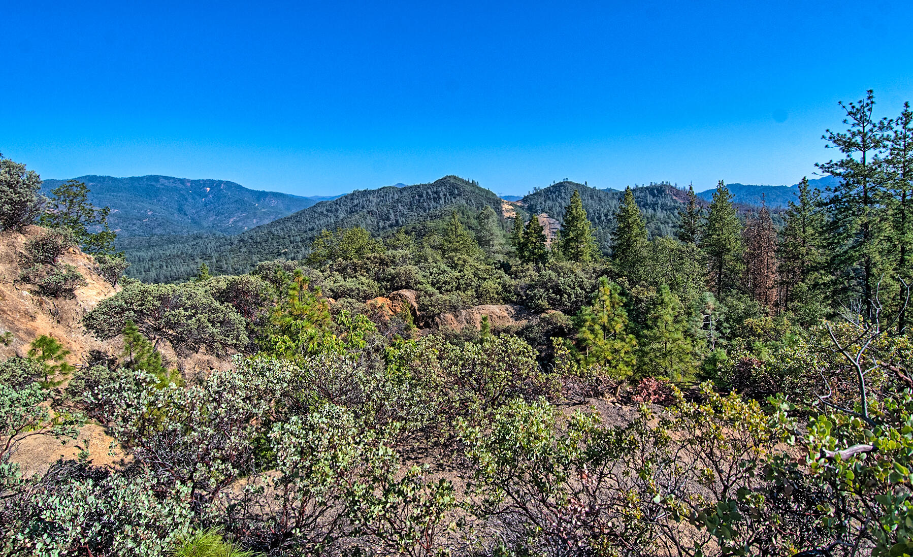 Walker Mine Road Redding, CA 96003 - Photo 25 of 38 a view of a city with a mountain in the background