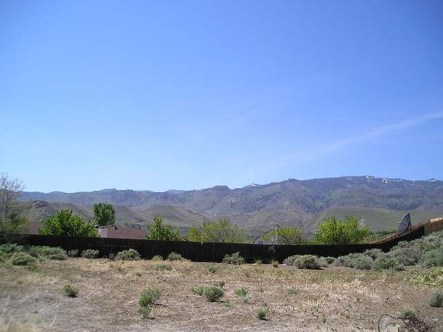 615 Cliff View Drive Reno, NV 89523 - Photo 1 of 1 a view of a lake with mountains in the background