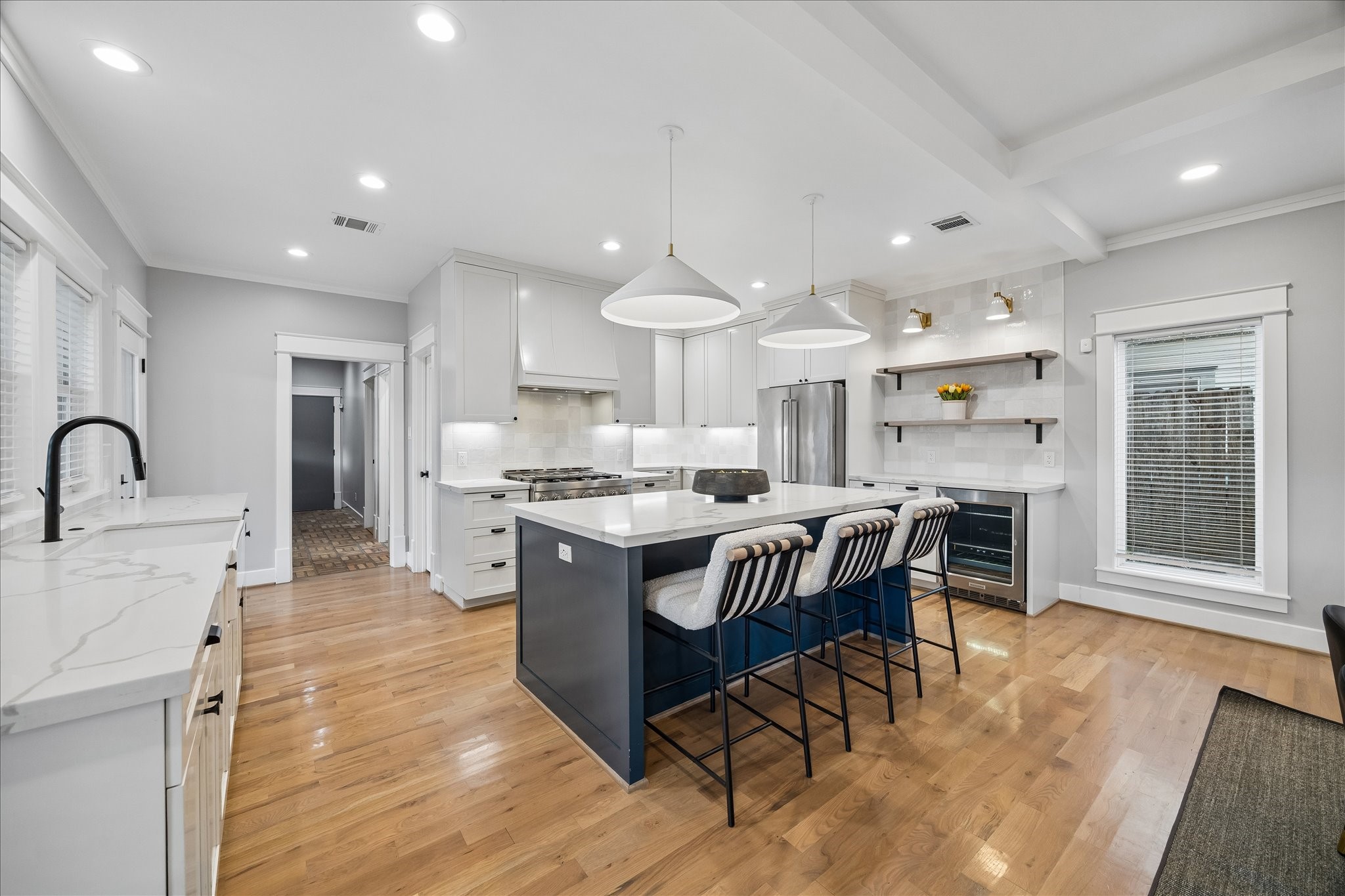 1205 Temple Street Houston, TX 77009 - Photo 13 of 33 Designed for both the accomplished cook and the everyday entertainer, the kitchen combines timeless finishes, generous workspace, and effortless flow into the home's central gathering spaces.