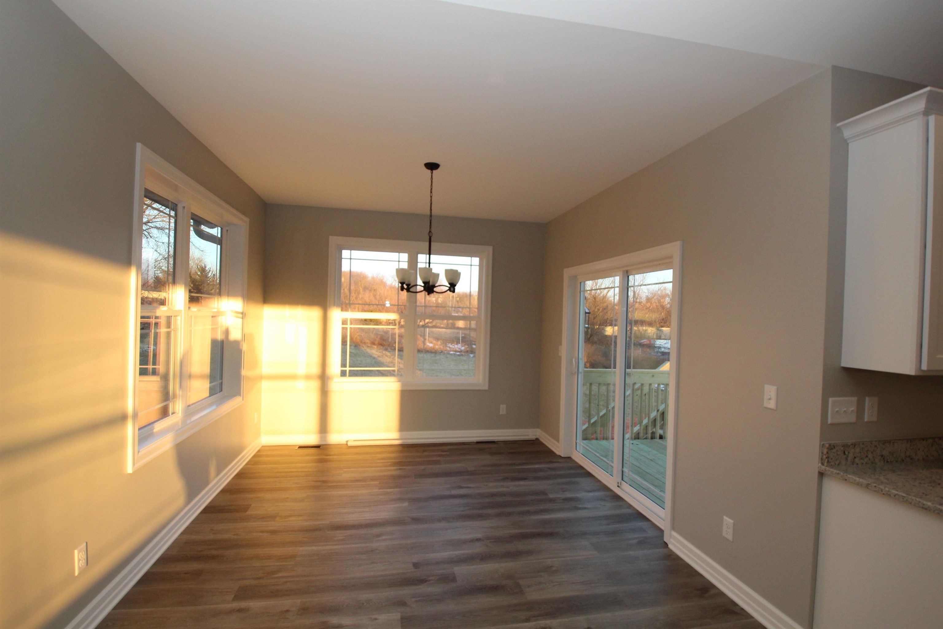 11235 Dublin Drive Roscoe, IL 61073 - Photo 9 of 20 a view of an entryway with wooden floor