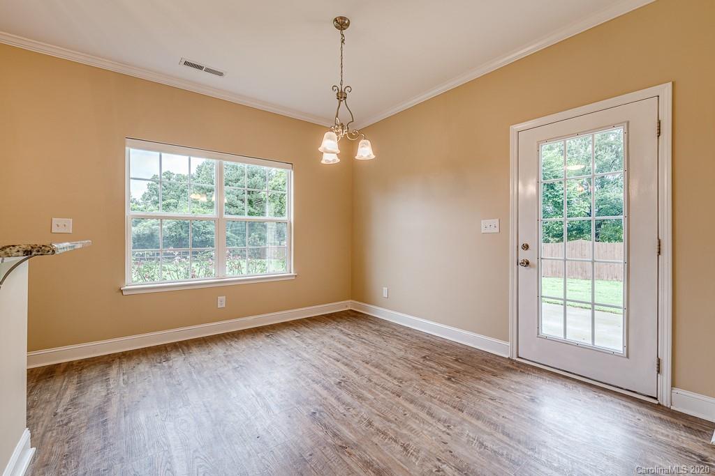 2510 Fletcher Broome Road Monroe, NC 28112 - Photo 27 of 48 a view of livingroom with window wooden floor and front door