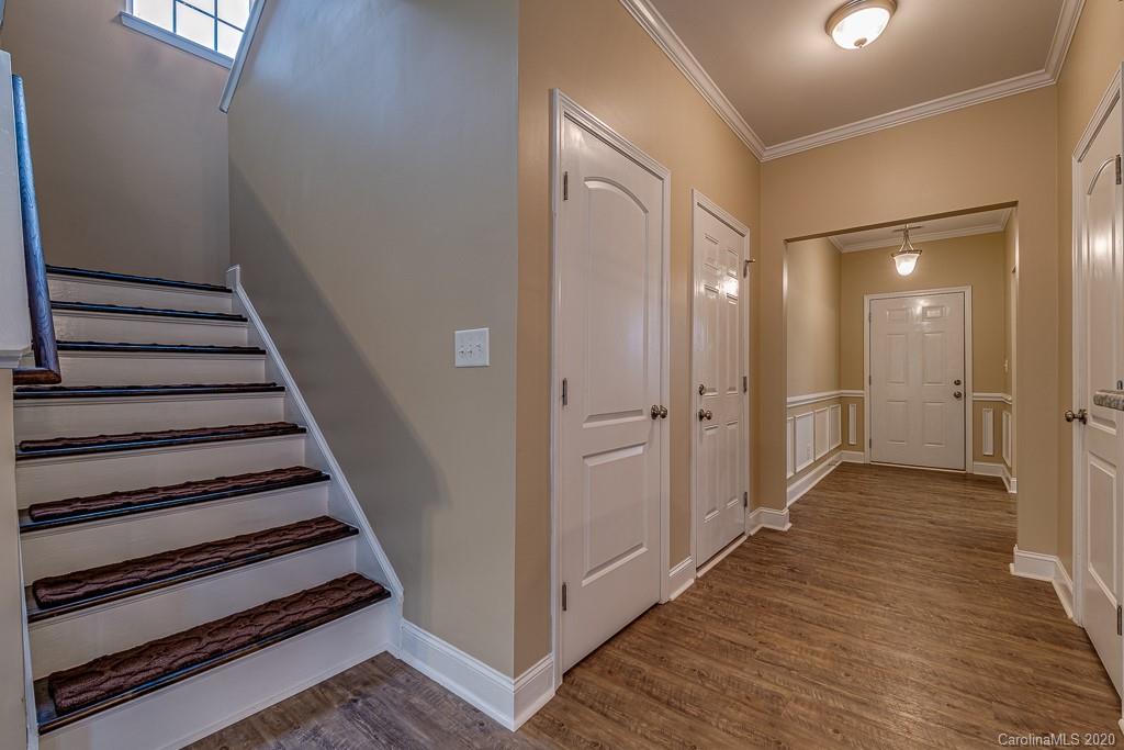 2510 Fletcher Broome Road Monroe, NC 28112 - Photo 28 of 48 a view of a hallway with wooden floor and entryway