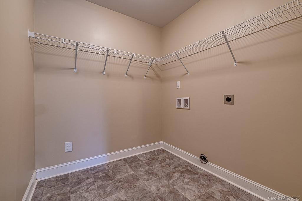 2510 Fletcher Broome Road Monroe, NC 28112 - Photo 38 of 48 a view of a room with racks on the wall