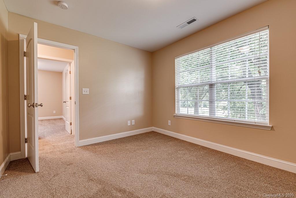 2510 Fletcher Broome Road Monroe, NC 28112 - Photo 40 of 48 an empty room with windows and closet