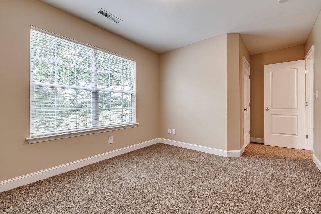 2510 Fletcher Broome Road Monroe, NC 28112 - Photo 43 of 48 an empty room with windows
