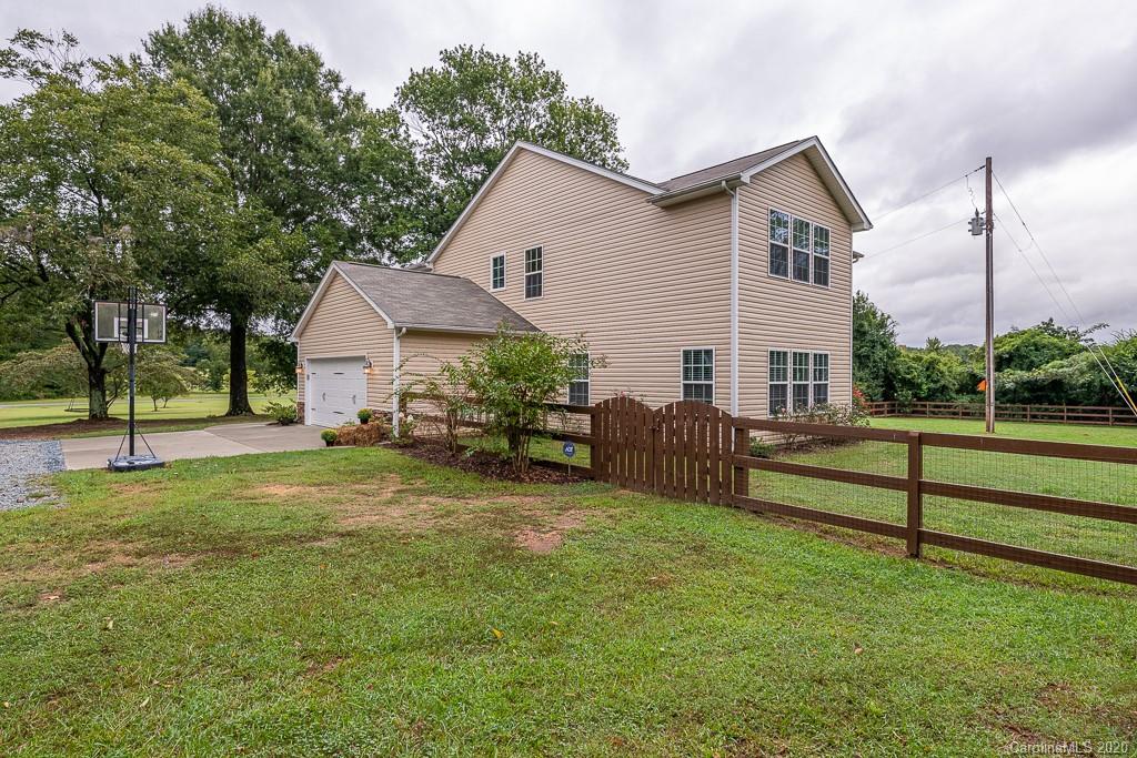 2510 Fletcher Broome Road Monroe, NC 28112 - Photo 46 of 48 a view of a house with a yard and sitting area