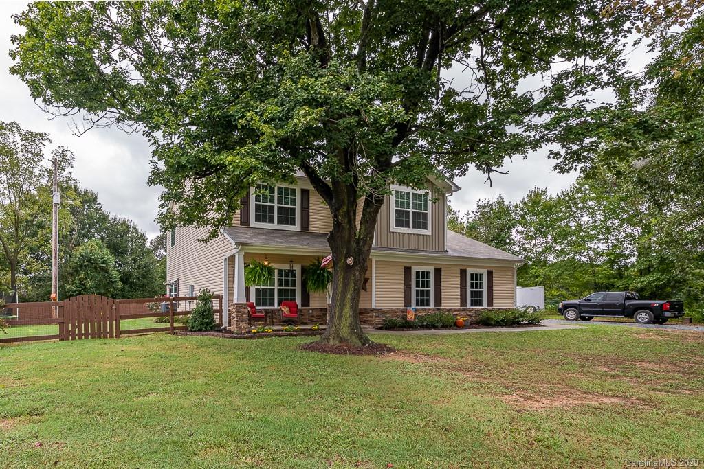 2510 Fletcher Broome Road Monroe, NC 28112 - Photo 6 of 48 a front view of a house with a garden