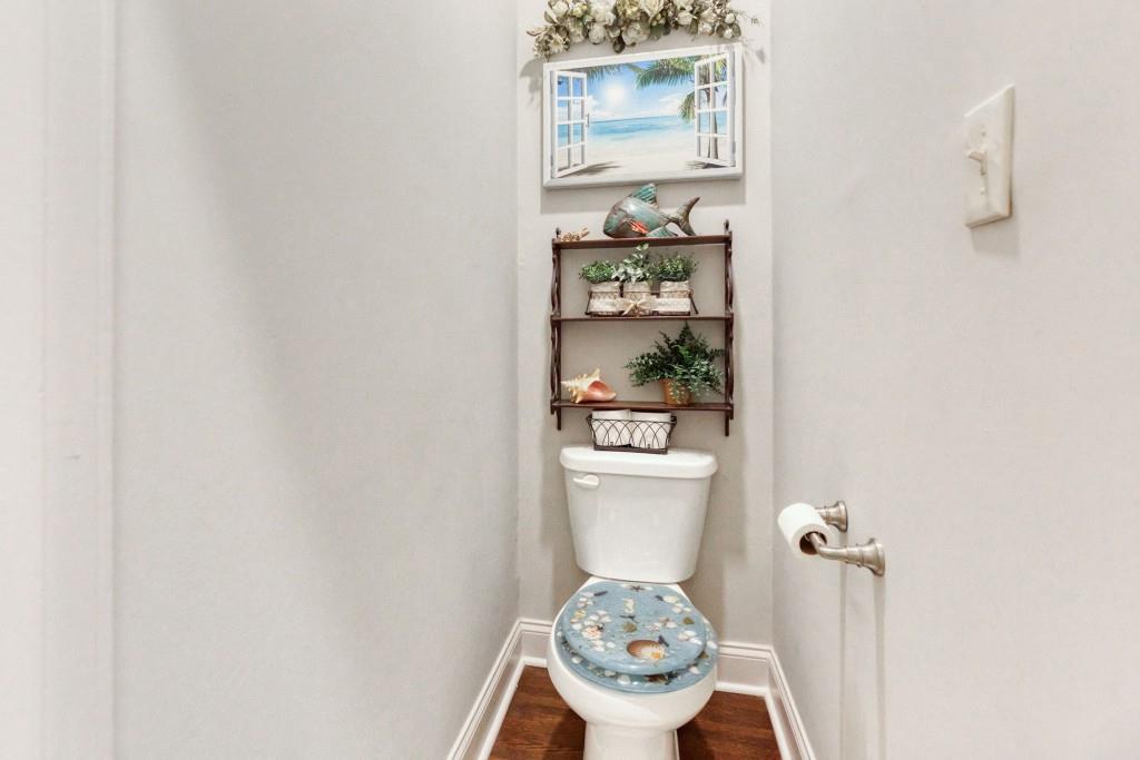 304 Edwards Street Monroe, GA 30655 - Photo 23 of 64 a close up of a wall with a toilet