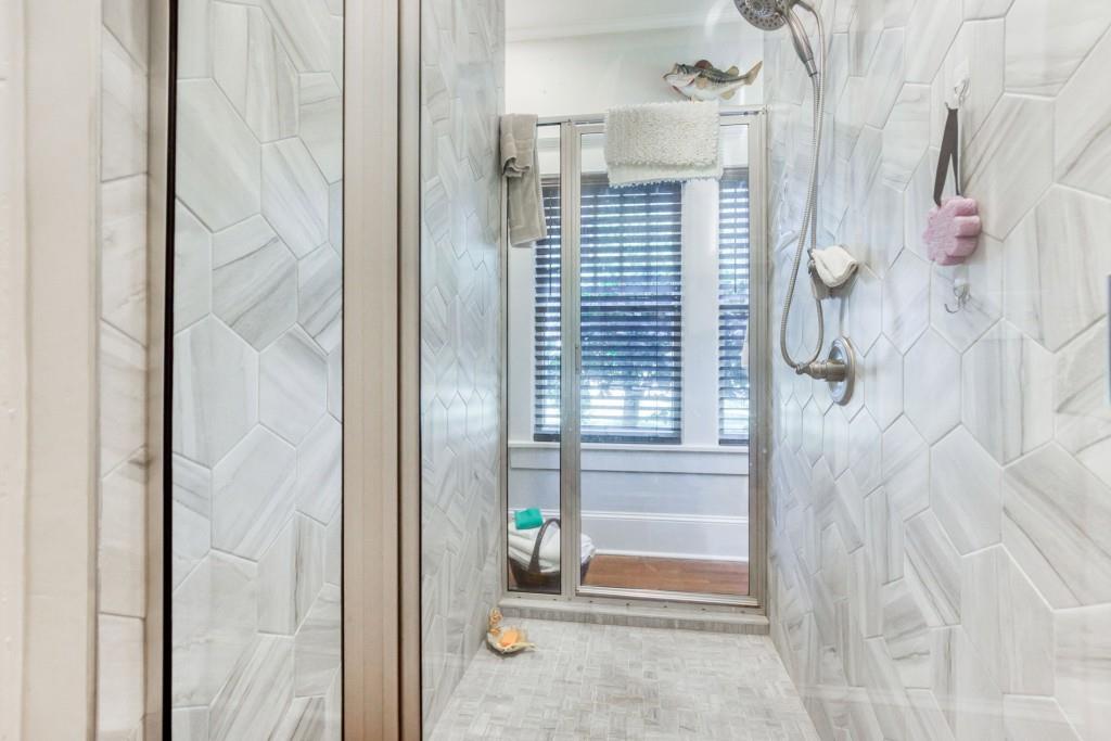 304 Edwards Street Monroe, GA 30655 - Photo 24 of 64 a bathroom with a shower