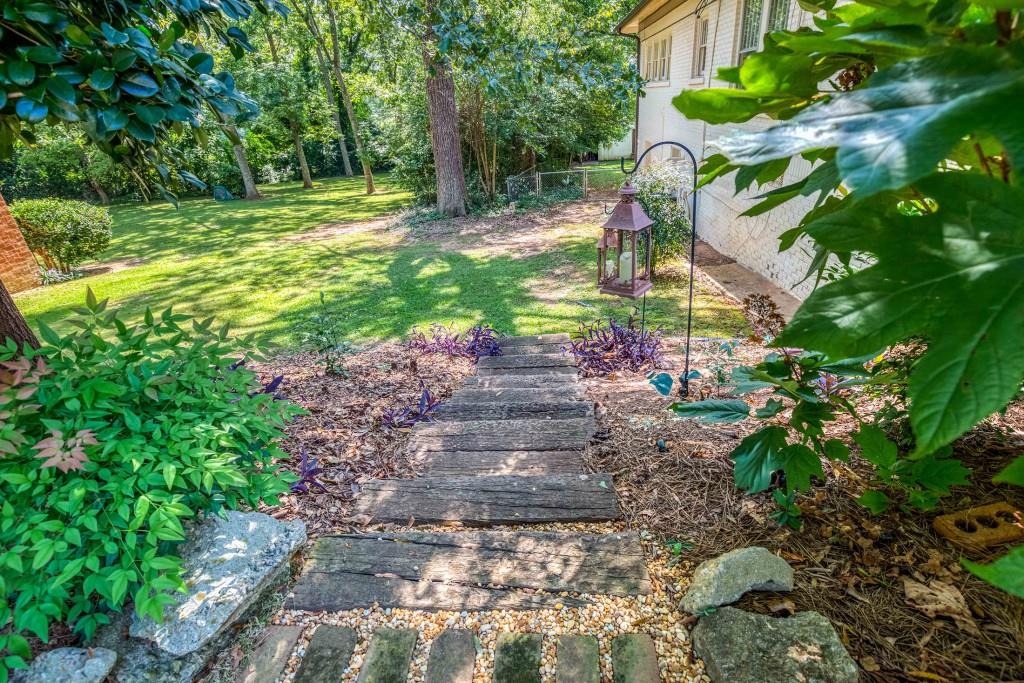 304 Edwards Street Monroe, GA 30655 - Photo 46 of 64 a view of a tree with a yard
