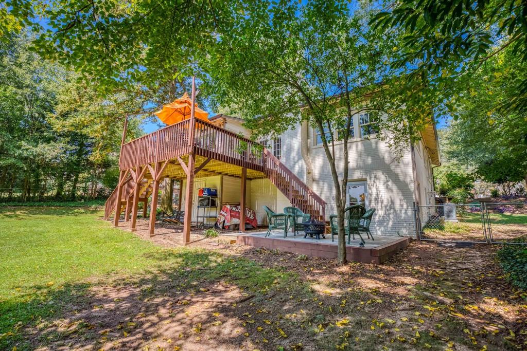 304 Edwards Street Monroe, GA 30655 - Photo 55 of 64 a view of a park with large trees