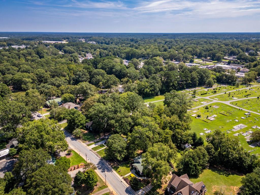 304 Edwards Street Monroe, GA 30655 - Photo 58 of 64 an aerial view of a houses with a yard