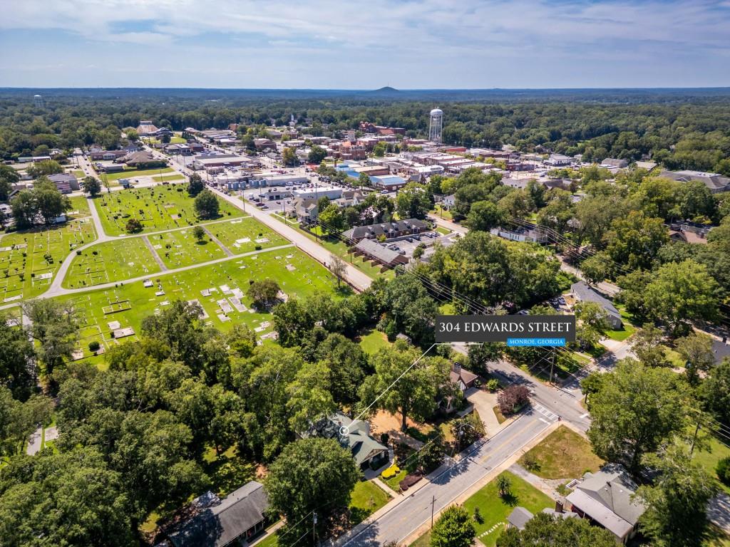 304 Edwards Street Monroe, GA 30655 - Photo 59 of 64 an aerial view of residential houses with outdoor space