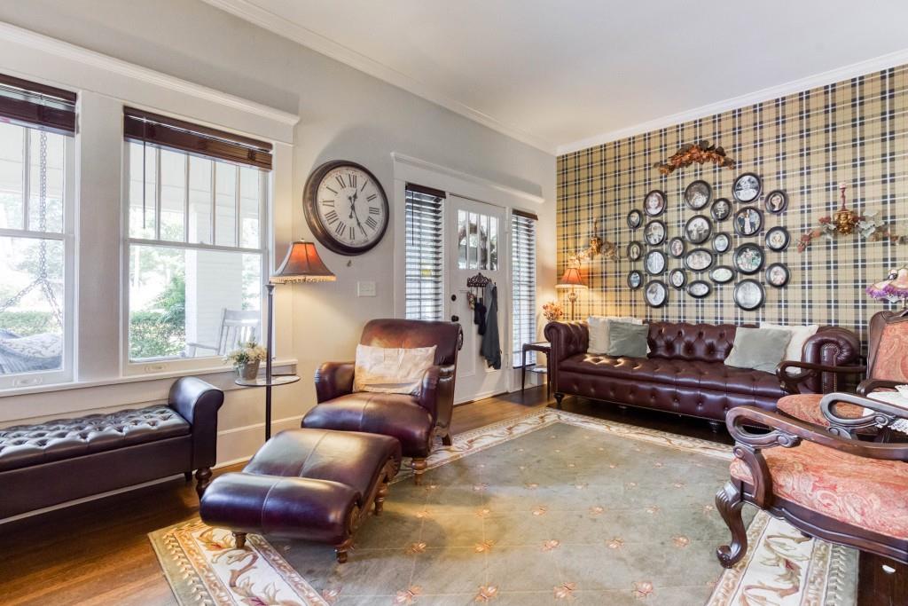 304 Edwards Street Monroe, GA 30655 - Photo 6 of 64 a living room with furniture a rug and a window