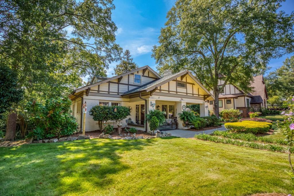 304 Edwards Street Monroe, GA 30655 - Photo 63 of 64 a front view of a house with yard and green space