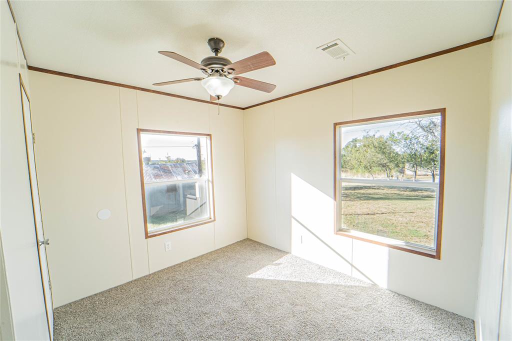 605 South Butte Street Breckenridge, TX 76424 - Photo 12 of 26 a view of an empty room with a window