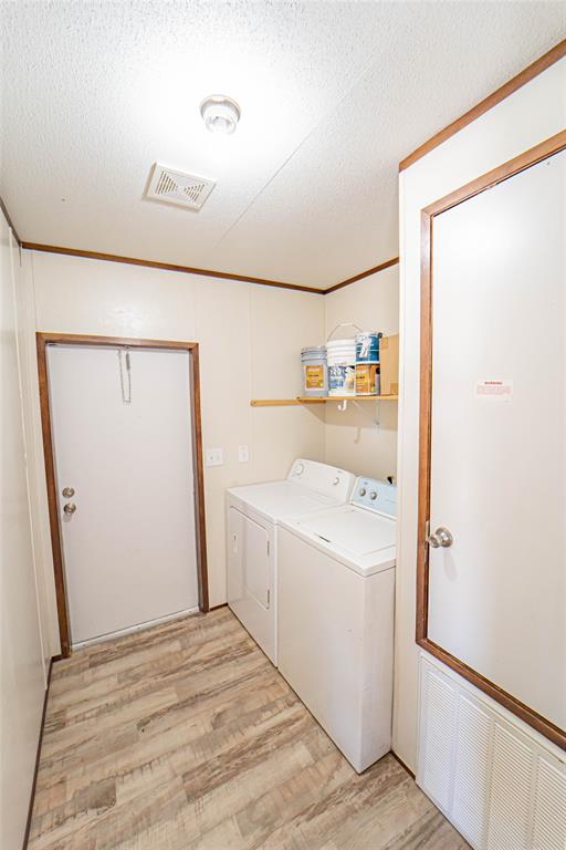 605 South Butte Street Breckenridge, TX 76424 - Photo 14 of 26 a view of utility room with washer and dryer