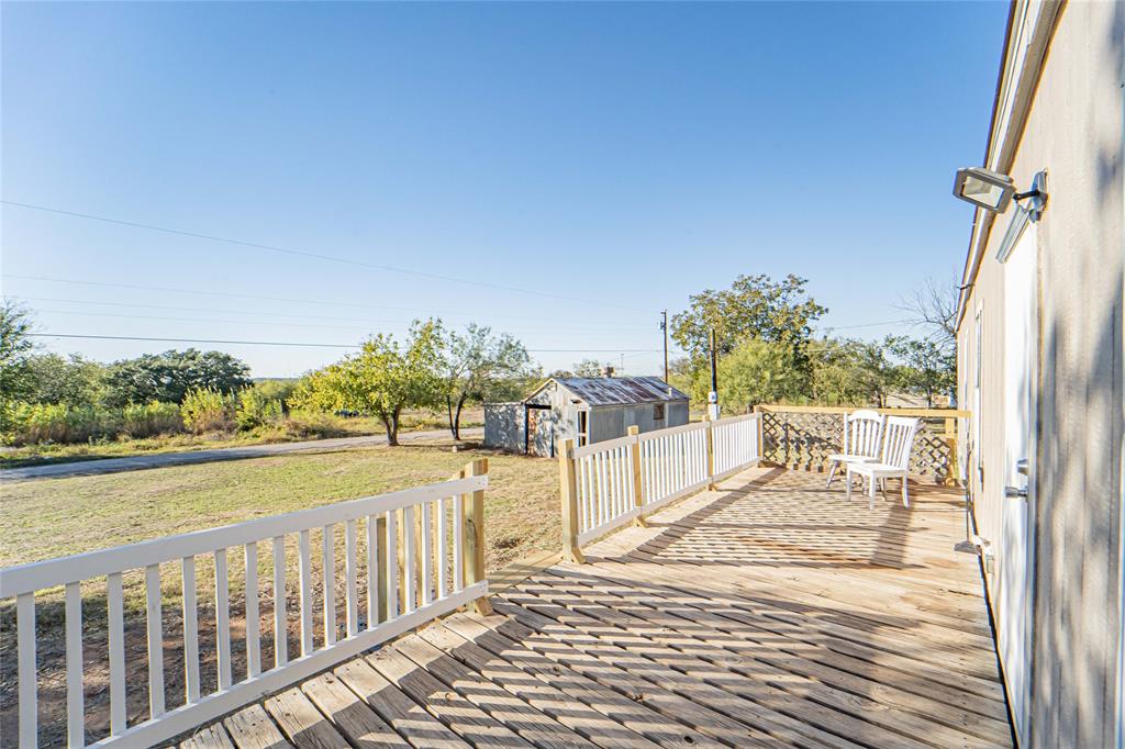 605 South Butte Street Breckenridge, TX 76424 - Photo 17 of 26 a view of a balcony with an ocean view