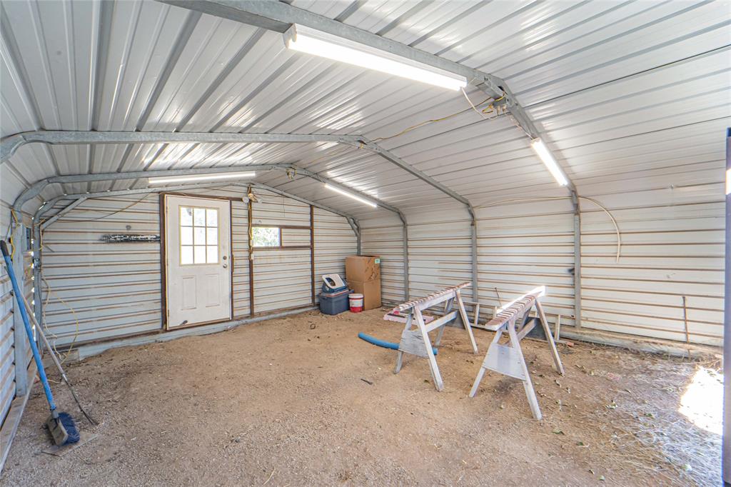 605 South Butte Street Breckenridge, TX 76424 - Photo 18 of 26 a view of a chairs in a patio