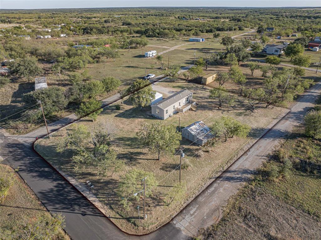 605 South Butte Street Breckenridge, TX 76424 - Photo 2 of 26 an aerial view of residential houses with outdoor space
