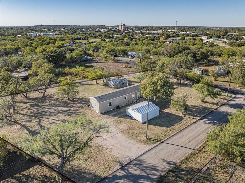 605 South Butte Street Breckenridge, TX 76424 - Photo 26 of 26 an aerial view of a house with a yard