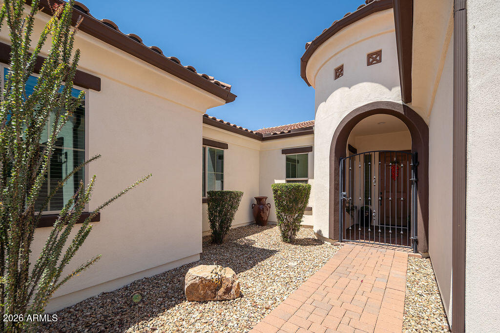 15730 West Harvard Street Goodyear, AZ 85395 - Photo 3 of 40 Paver Entry - Gutters