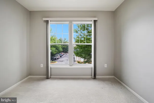 an empty room with window