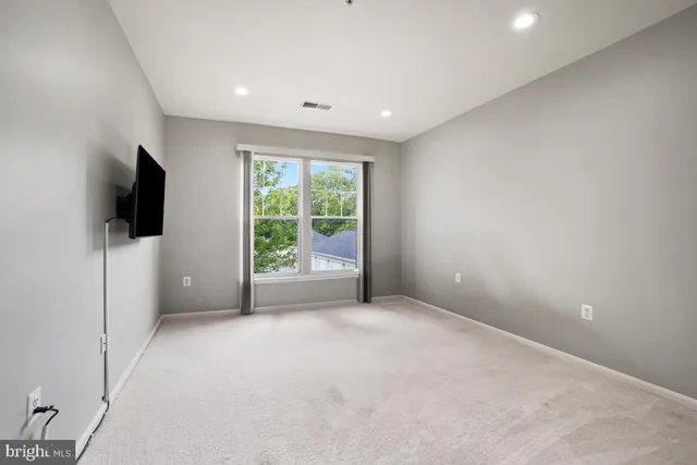 a view of a livingroom with a flat screen tv